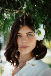 a girl posing for a Portrait Photograph