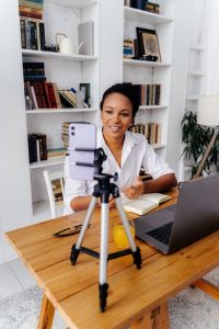 a woman recording a letter head video